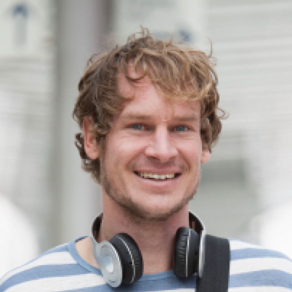 portrait of smiling man with headphones and should pfc5hdp 1 1.jpg